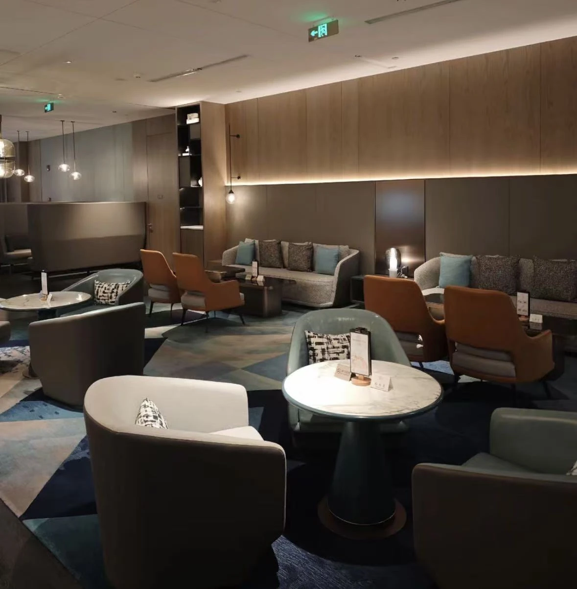 Crowne Plaza — Huijin Centre Phase II, Plot A · Public lounge · wood panelling and furniture layout